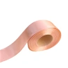 Vienpusė satino juostelė, rausvo smėlio spalvos
